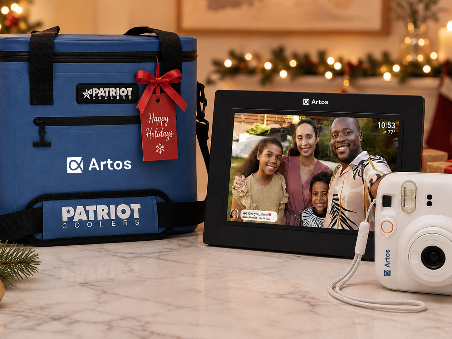 A curated set of premium branded gifts — a cooler bag, a digital photo frame, and an instant camera